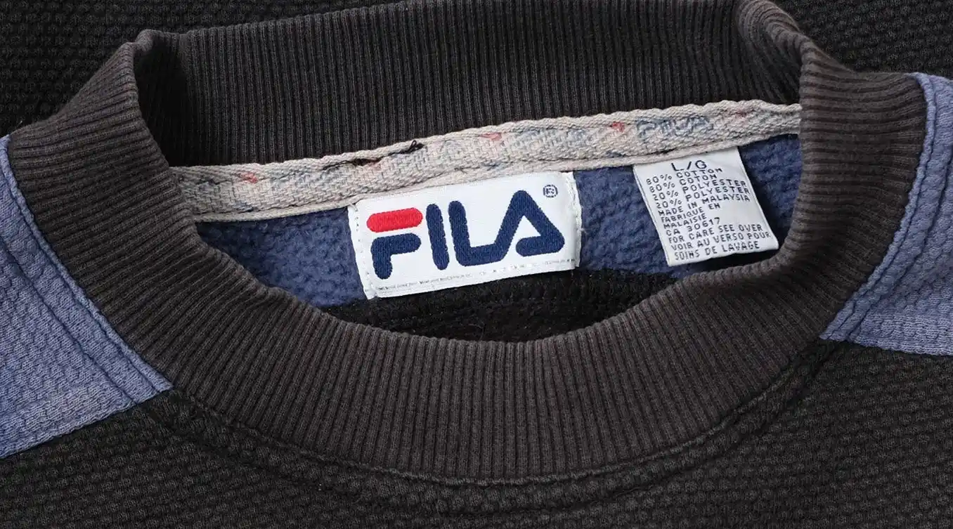 Одежда от Fila обесценилась на Lamoda. Дешевле уже некуда